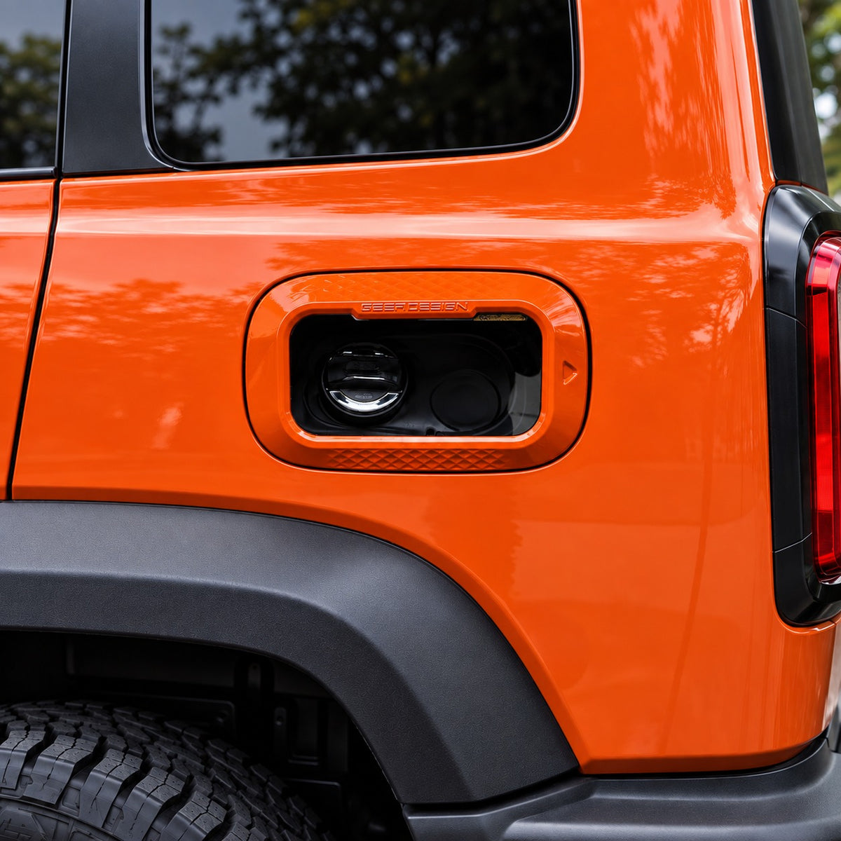 GWM Tank 300 Wide Body with orange fuel tank cover installed on the rear quarter panel