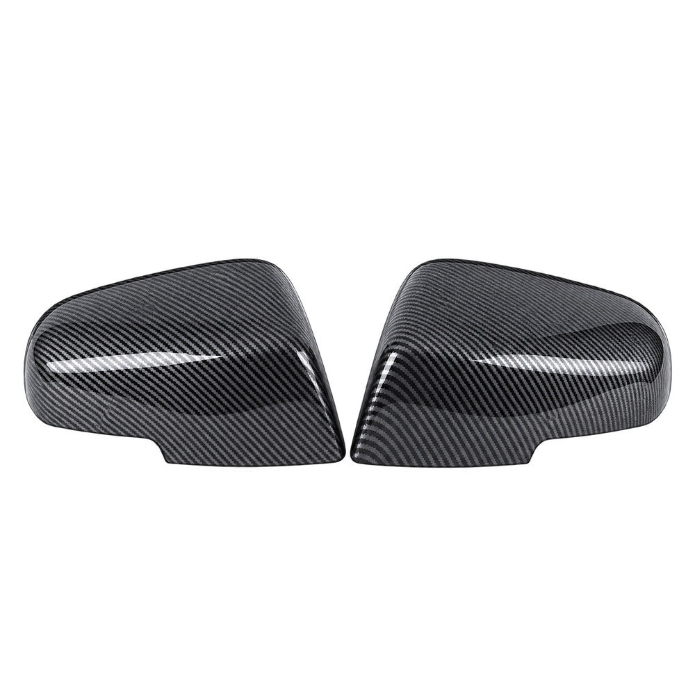 Carbon-pattern automotive side mirror covers with a glossy woven finish.