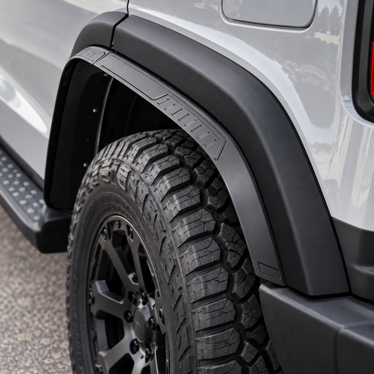 GWM TANK 300 black fender flare installed around the rear wheel arch close-up