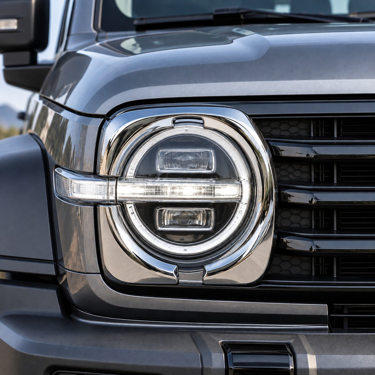 GWM Tank 300 with chrome headlight eyebrow frame cover installed around the front headlight