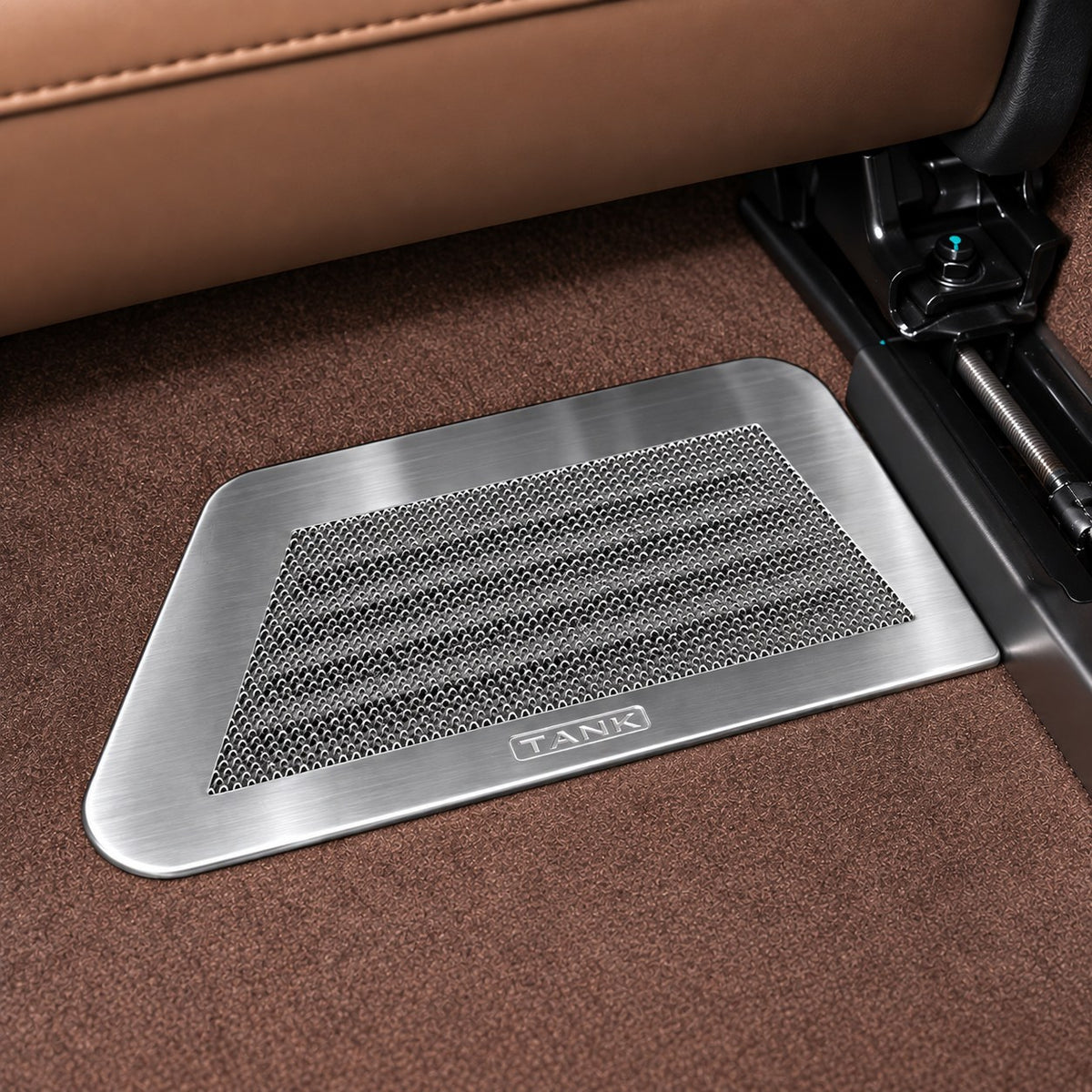 Silver TANK 700 Hi4-T seat air outlet protective cover installed beneath the car seat
