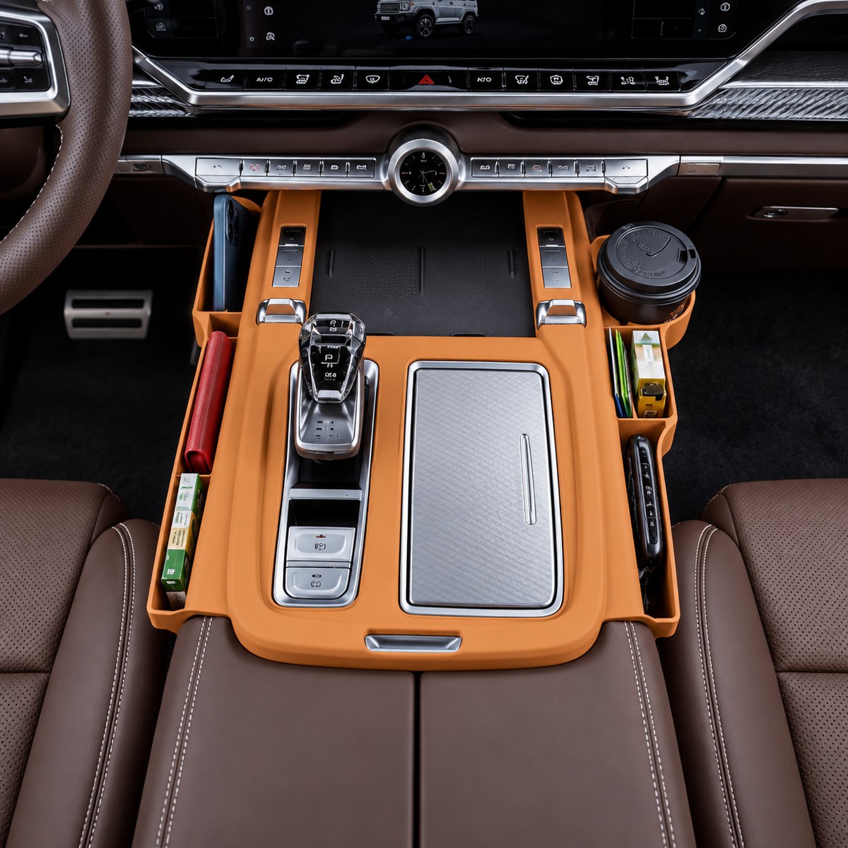 TANK 700 orange interior storage box installed in centre console with organised storage